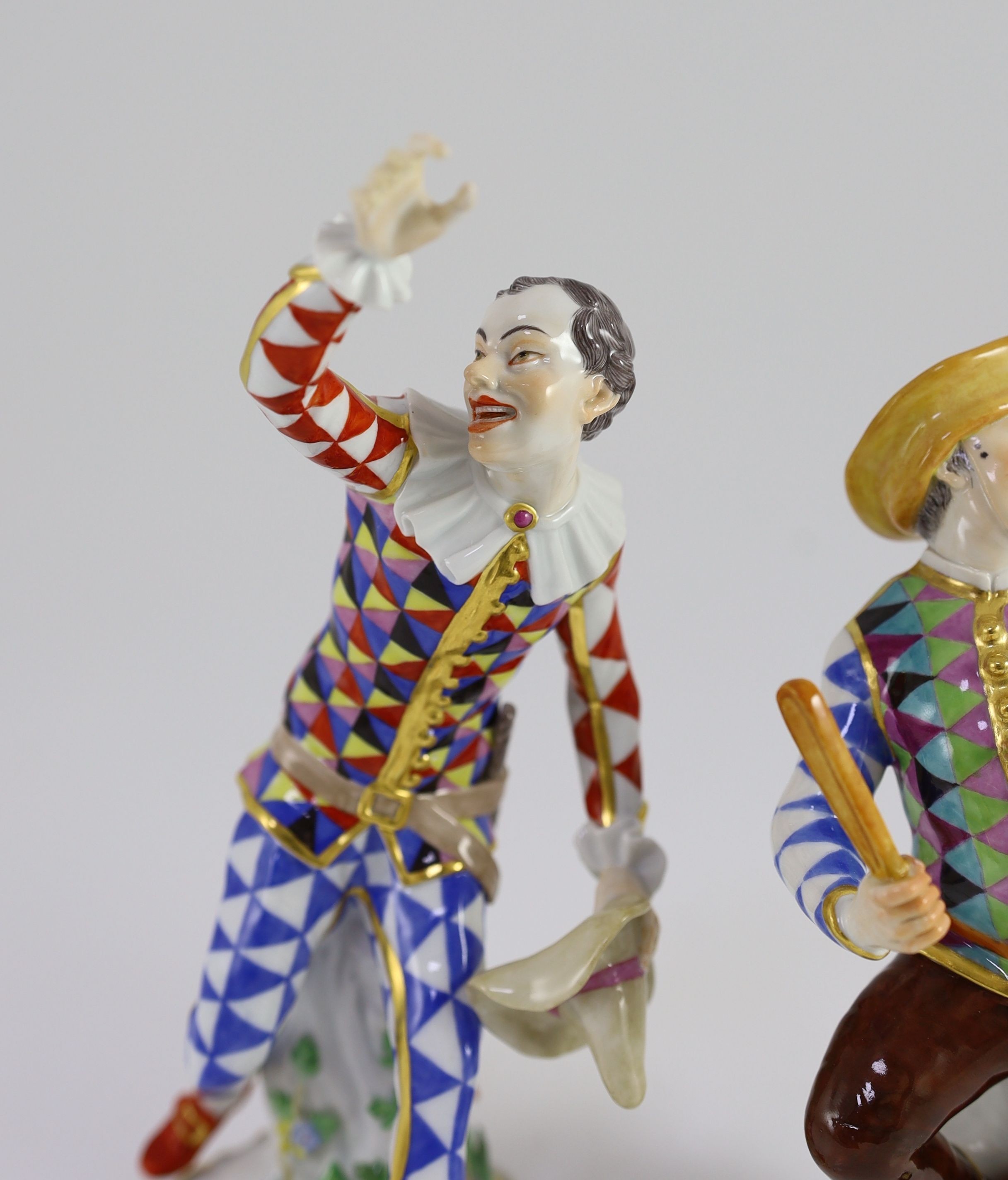 Two Meissen models of Harlequin, 20th century, 22.5 and 19cm high, both with some restoration